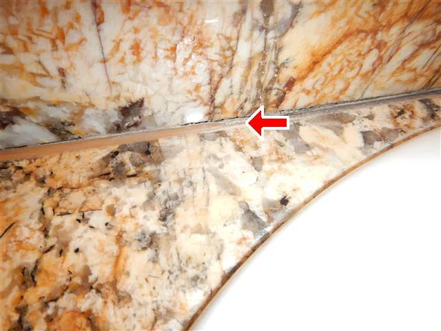 Inspection photo: backsplash grout gap